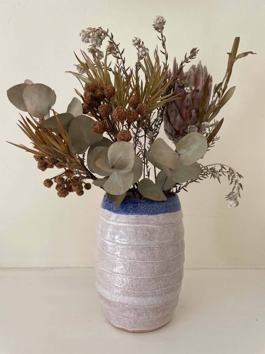 Blue and white stoneware clay vase
