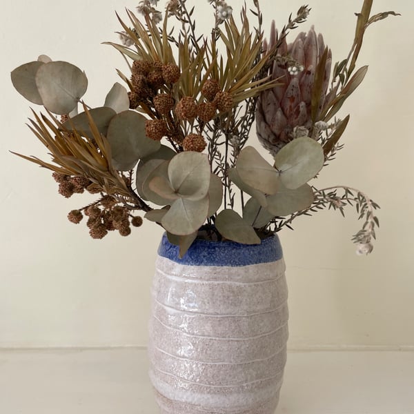 Blue and white stoneware clay vase