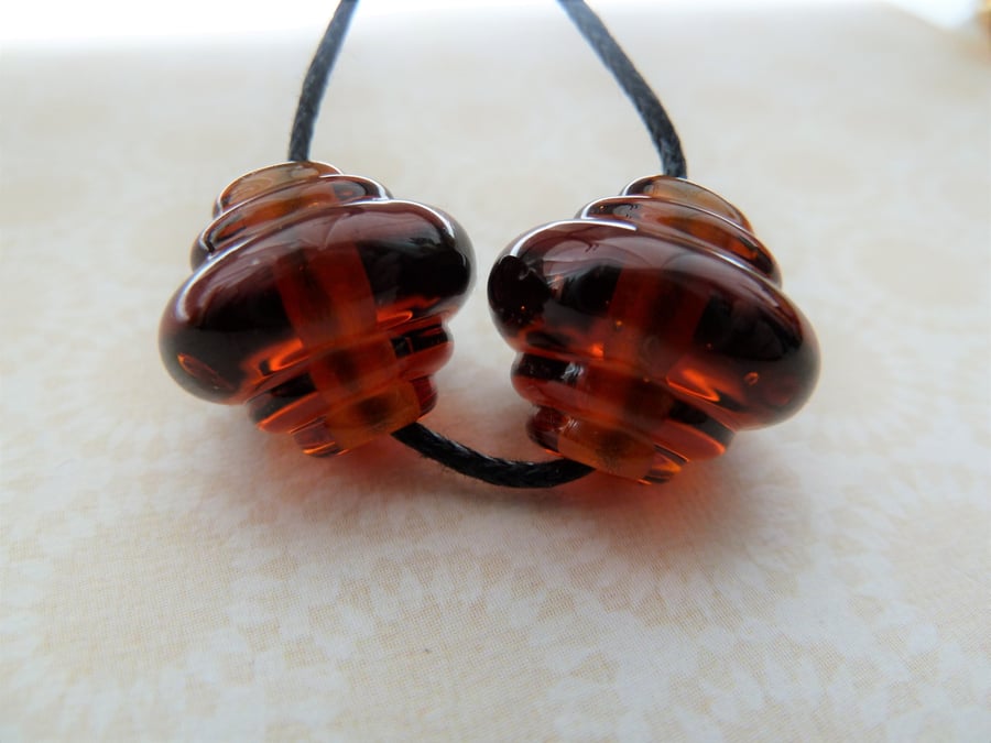 handmade lampwork amber glass beads, ornate pair