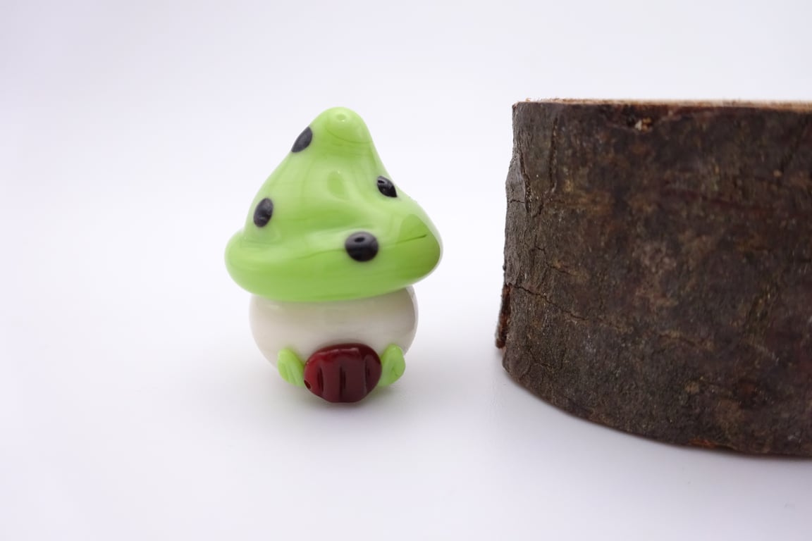 small glass toadstool house