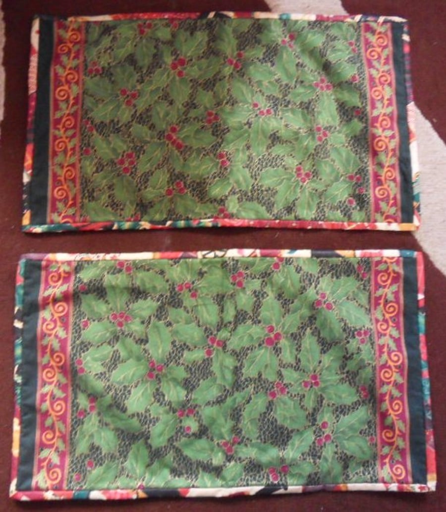 Homemade Christmas table mats. 2 in this set. Holly design