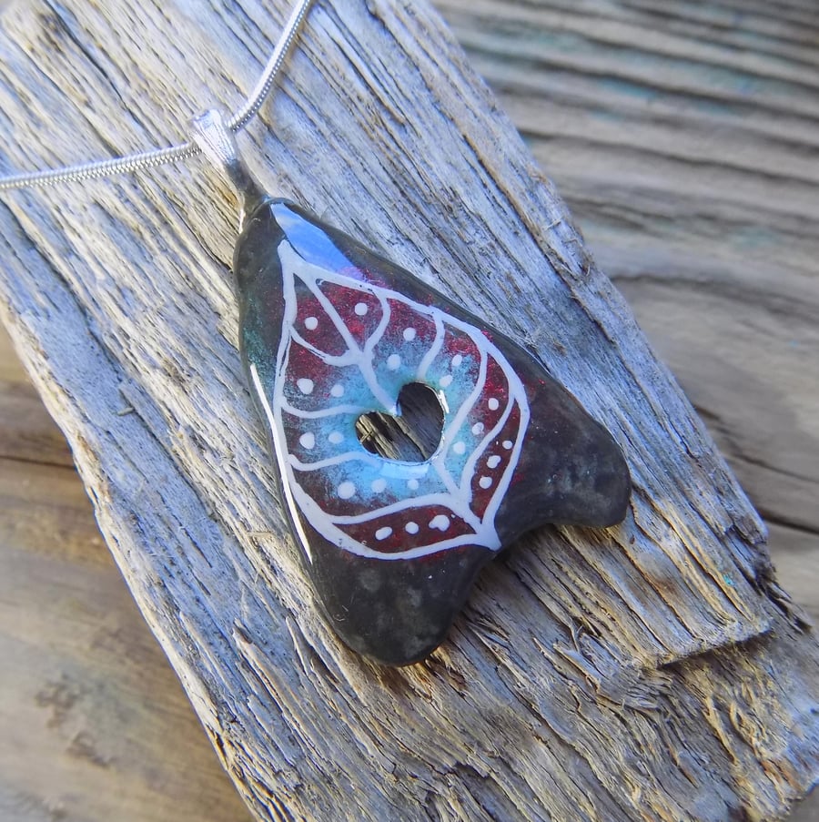 Slate drilled heart pendant sealed in resin 