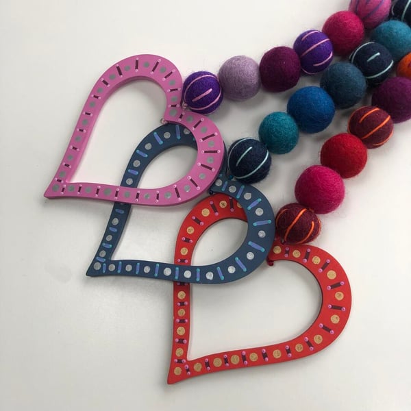 Handpainted loveheart hanging decoration with Nepalese woollen felt balls 