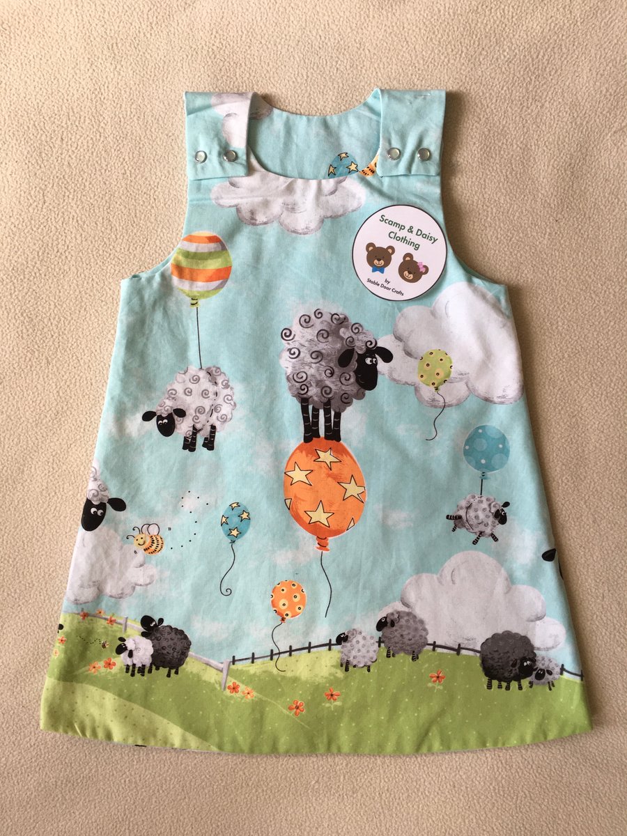 Age 2 years Reversible Pinafore Dress. 
