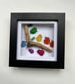 Seaglass family of birds on a branch  picture 