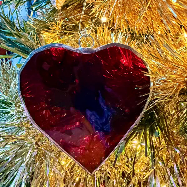 Stained glass pair of hearts in dark red transparent glass, medium sized