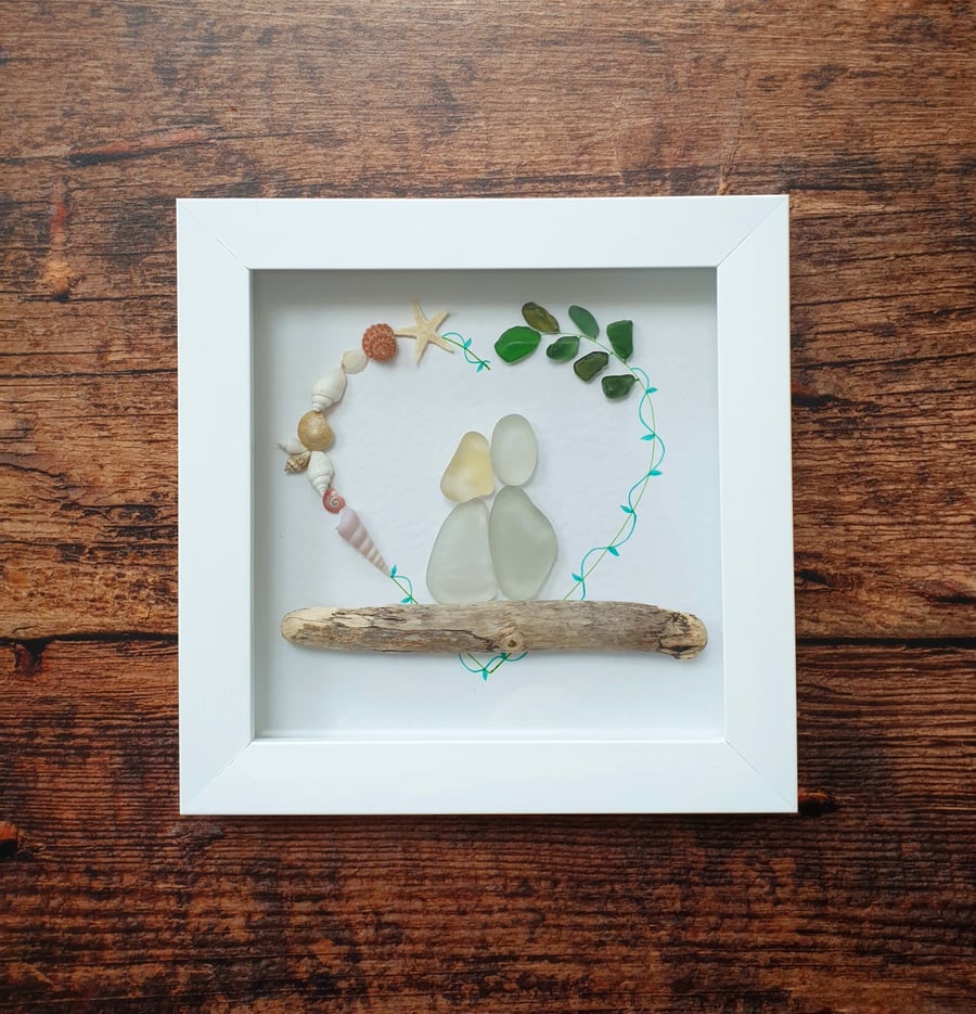 Sea glass, seashells and driftwood couple