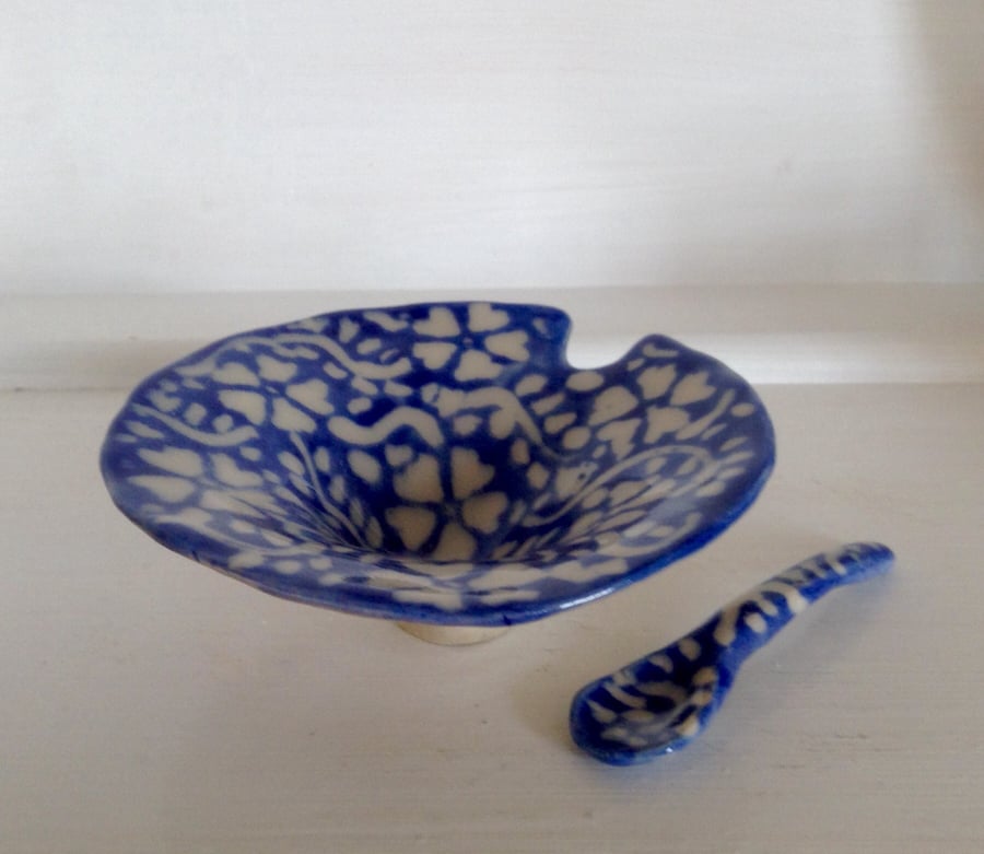 Small blue and white stoneware dish with fitted spoon.