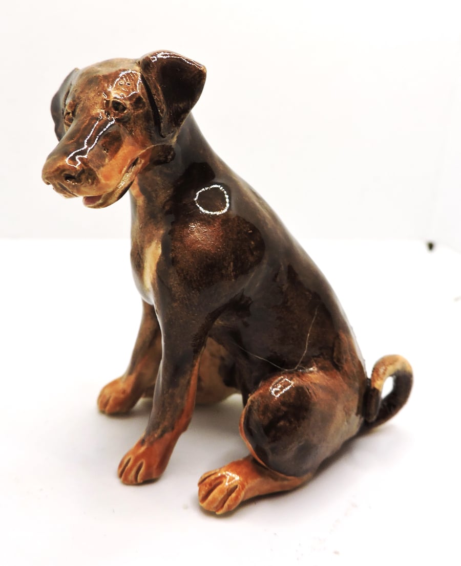 Miniature ceramic doberman sculpture 