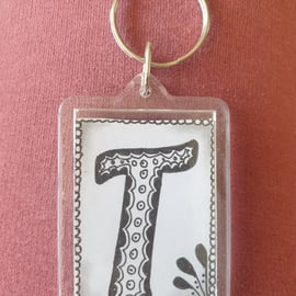 Hand drawn initial "T" keyring.