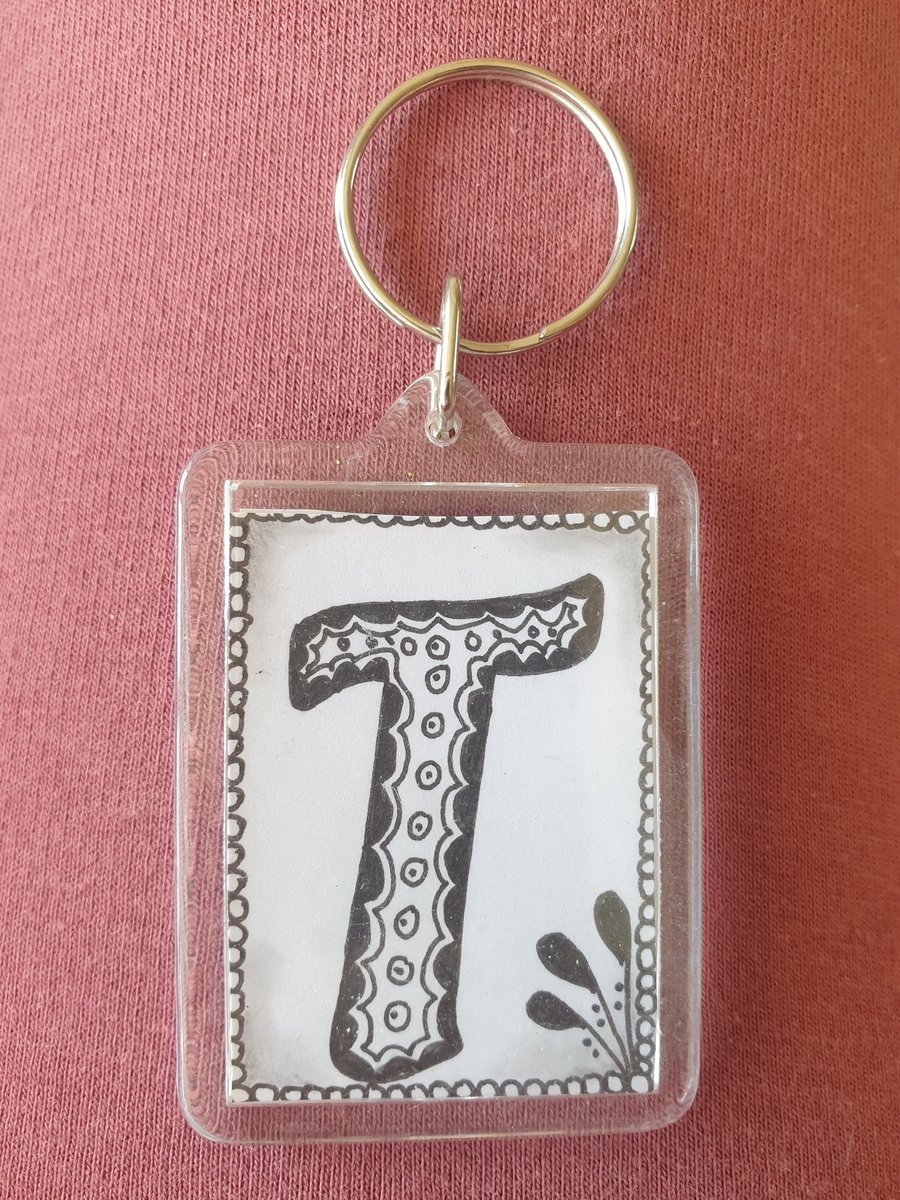 Hand drawn initial "T" keyring.