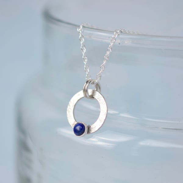 Textured silver circle necklace with lapis lazuli stone 