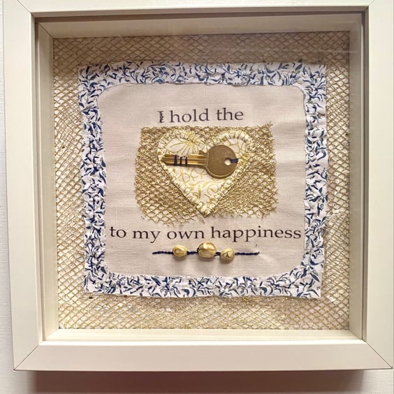 Blue and gold heart,  happiness affirmation statement 
