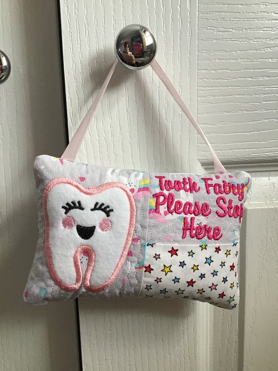 Tooth fairy cushion.