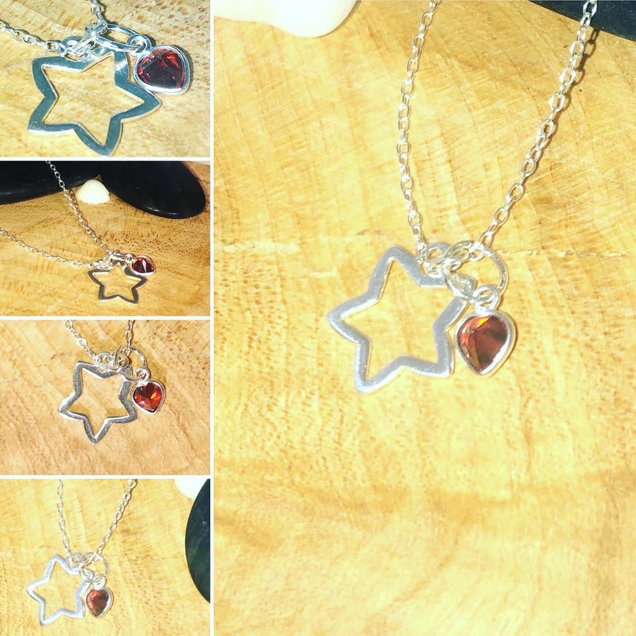 Sterling Silver Star pendant with ruby Red Swarovski heart charm 16” chain