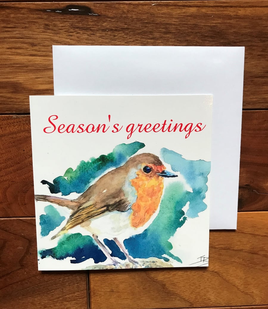 Christmas robin greeting card designed by British artist