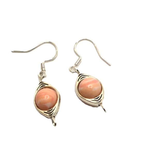 Pair of ladies earrings with Rhodochrosite beads in silvertone connectors