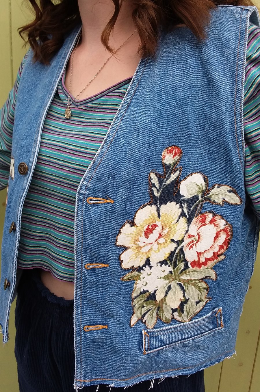 Upcycled denim waistcoat with flowers
