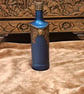 Upcycled wine bottle. Blue & gold. Handcrafted air dry clay embellishments