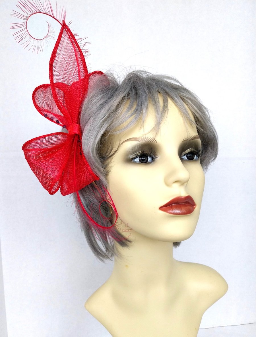 Fuchsia pink bow fascinator with beads and feathers