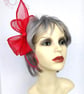Fuchsia pink bow fascinator with beads and feathers