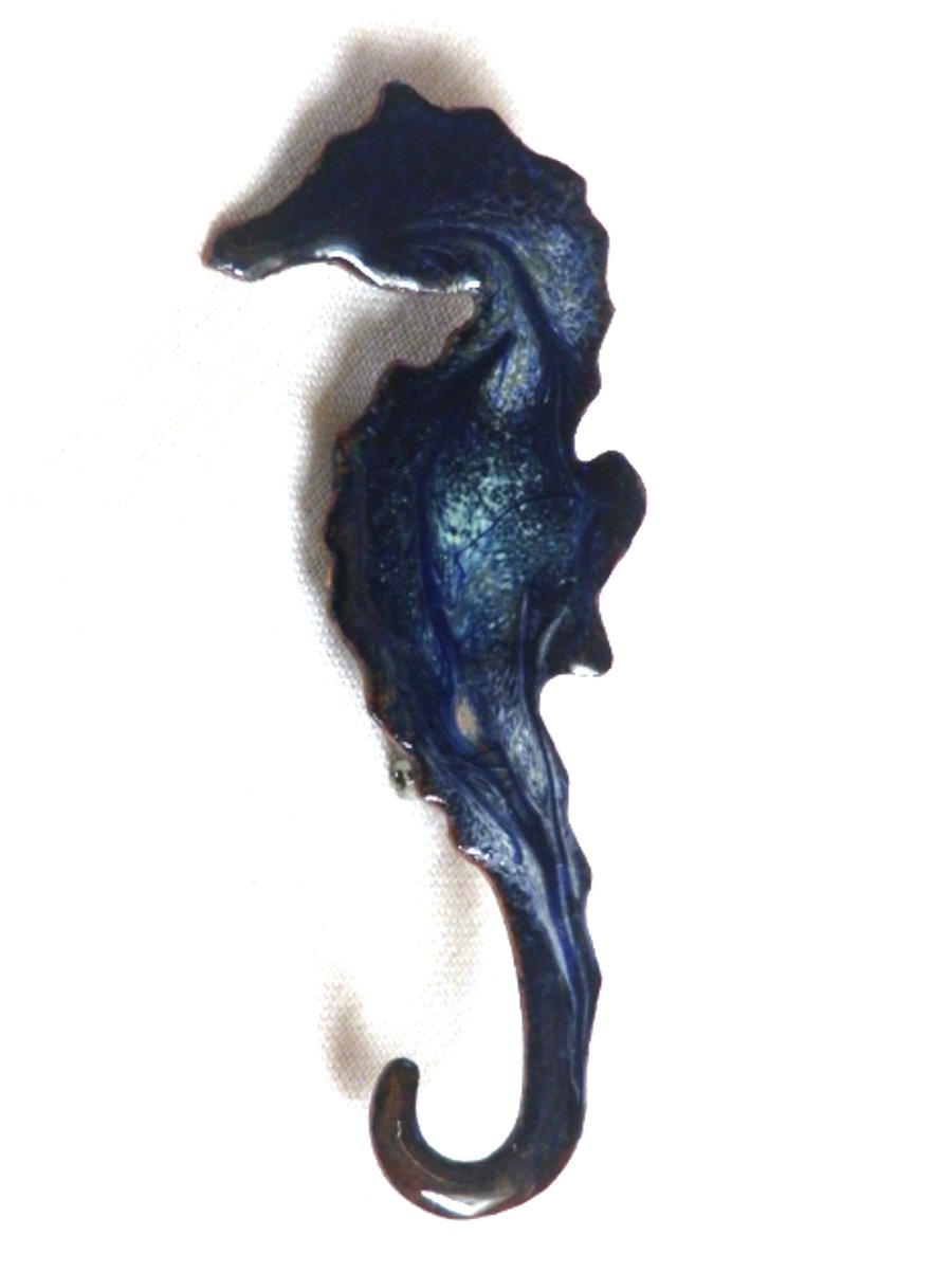 seahorse brooch - scrolled white and pale green over blue on clear enamel
