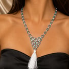 Blue and silver couloured chainmaille necklace with white tassle