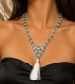 Blue and silver couloured chainmaille necklace with white tassle
