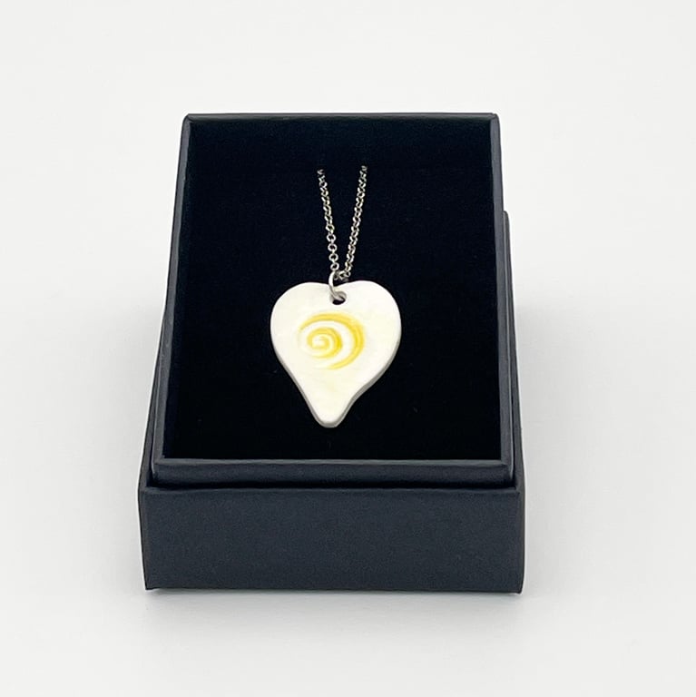Porcelain necklace with sunshine yellow spiral