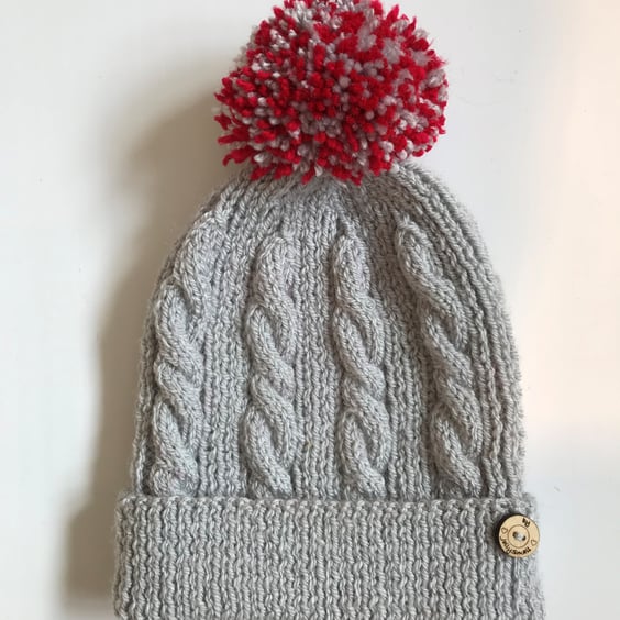 Kid's bobble hat with pompom to fit 4 - 7 years