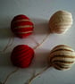 Crocheted Christmas baubles - red, cream & gold - Image 4