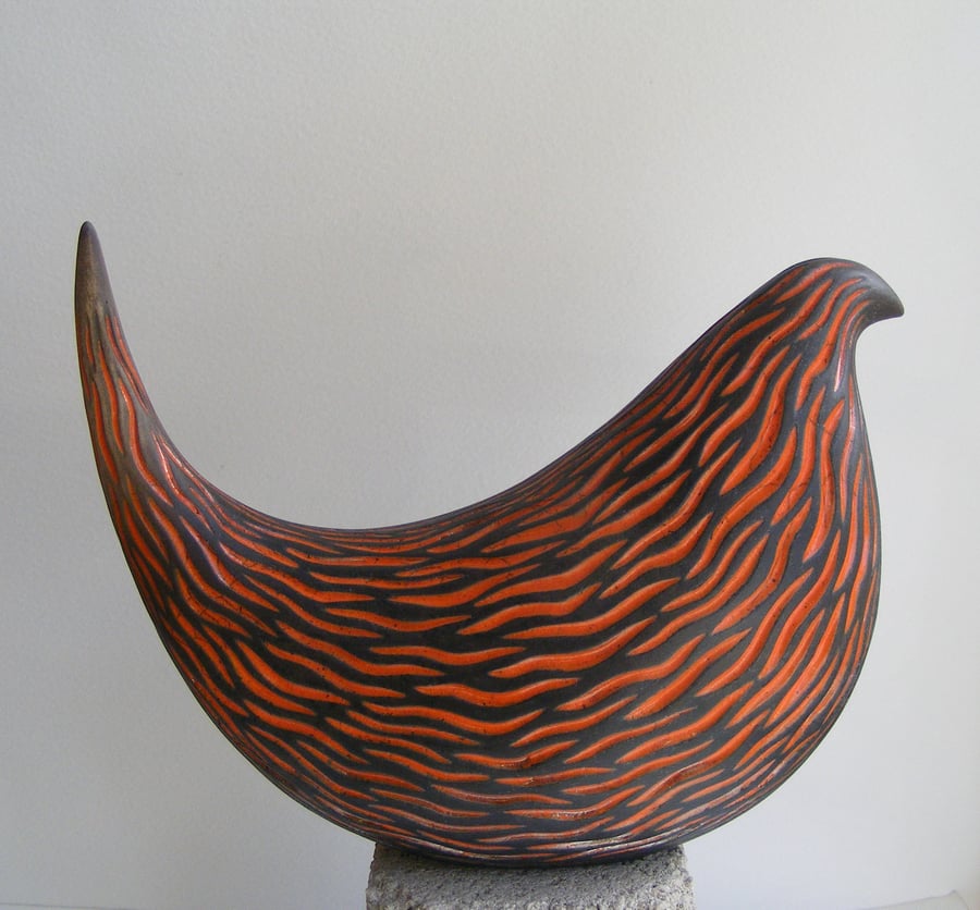 Long tailed raku glazed bird
