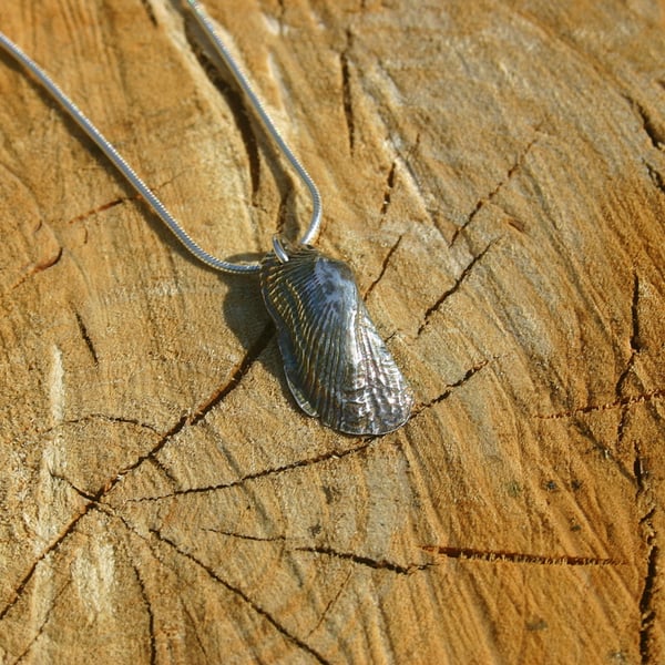 Fine Silver Sea Shell Charm on a sterling silver snake chain