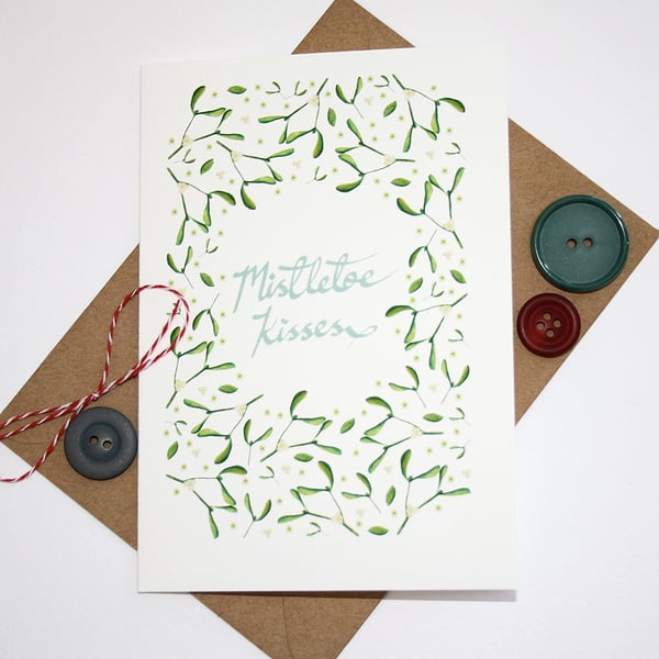 Mistletoe kisses christmas card