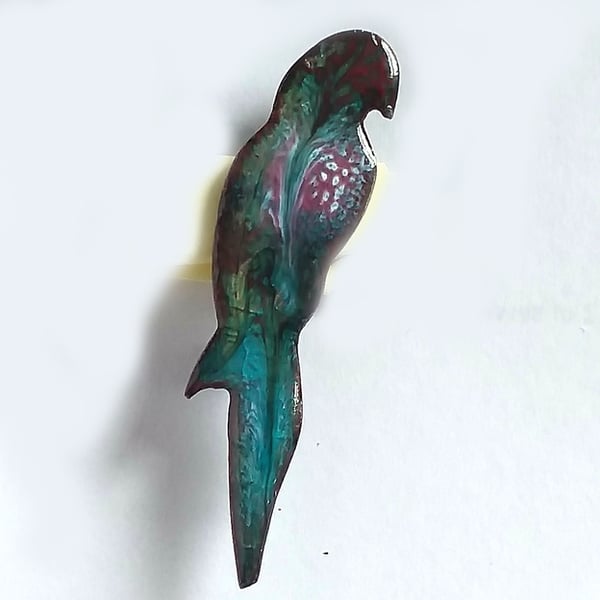 parrot brooch - scrolled red and white on turquoise