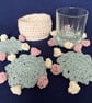 Set of four Rose flower drinking glass or mug coasters in a cream basket - Image 4