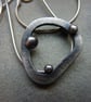 Atomic oval pendant - Image 1
