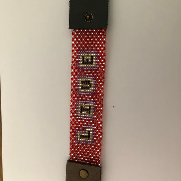 Leather and beadwork bracelet