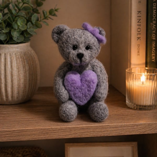 handmade needle felted teddy bear holding heart