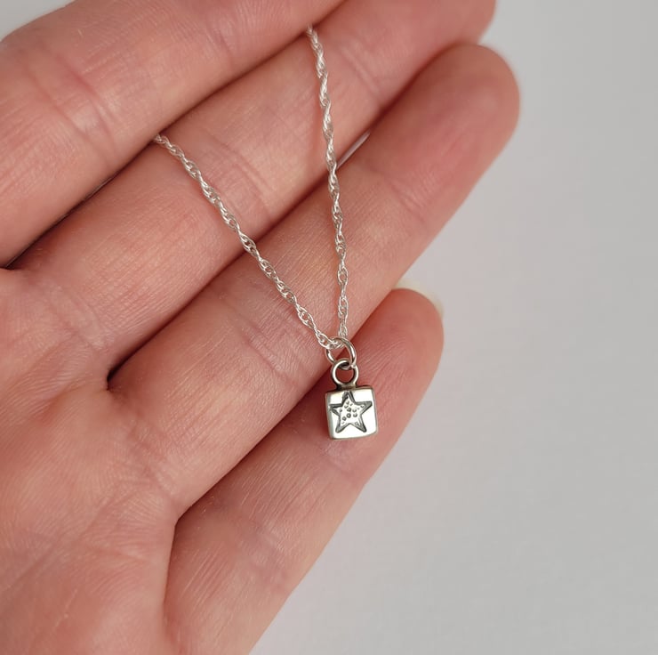 Tiny star necklace on sale sterling silver