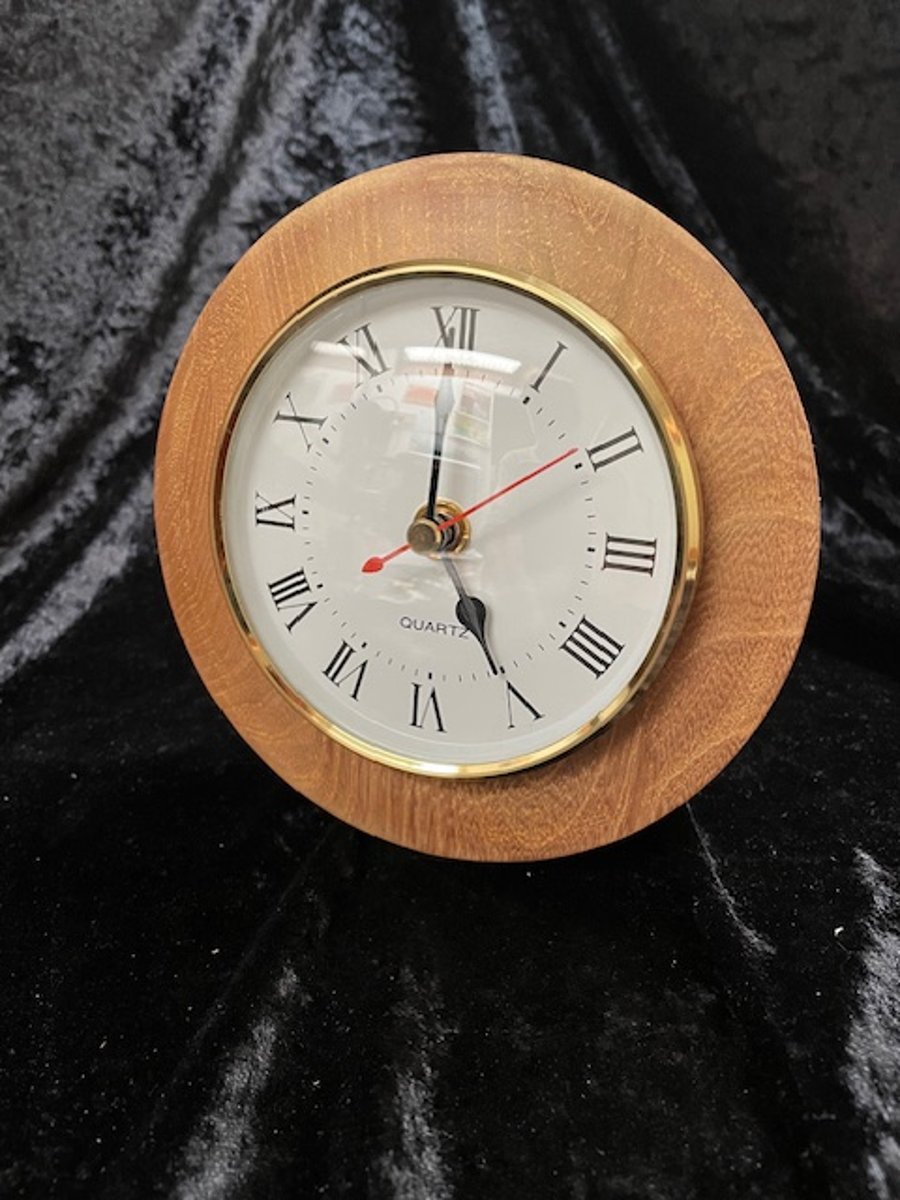 Clock in hardwood case