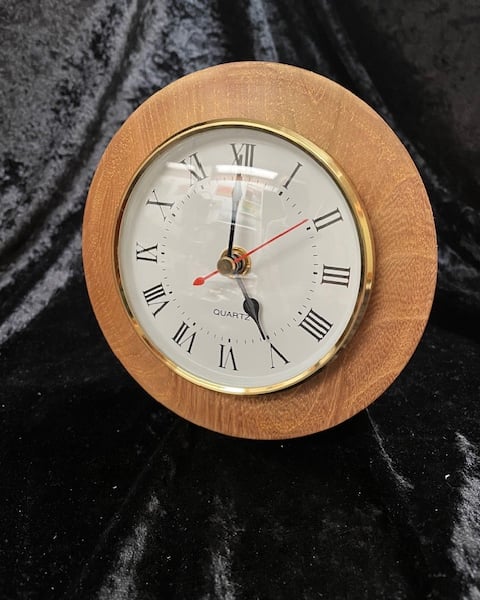 Clock in hardwood case