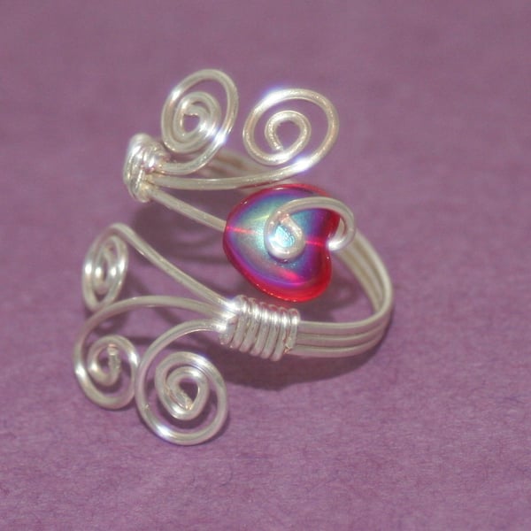 Adjustable wire ring with red heart bead