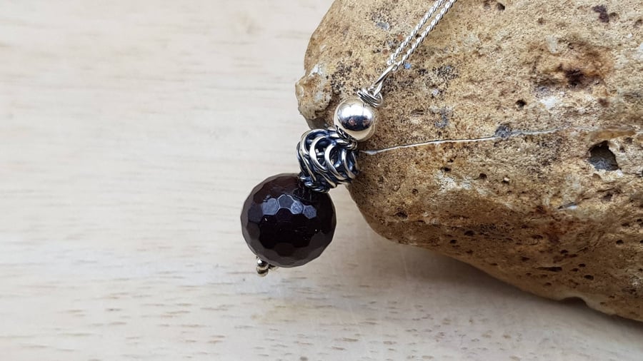 Small Garnet pendant necklace. Reiki jewelry uk. January birthstone