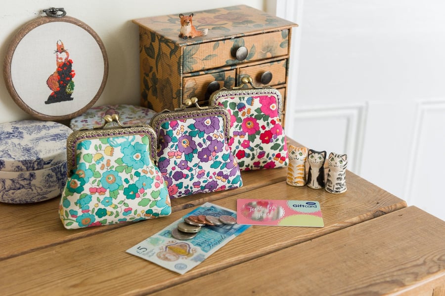 Coin purse made with 'Betsy' print Liberty Tana Lawn outer and purple lining