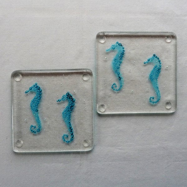 Seahorse blue bubble fused glass coasters. Set of two