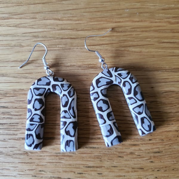 Arch Shaped Drop Statement Earrings in a Leopard Print Design