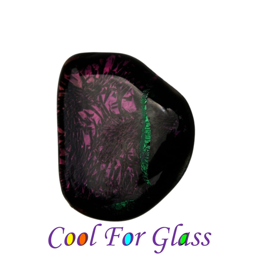 Fused glass brooch with purple and green iridescent glass