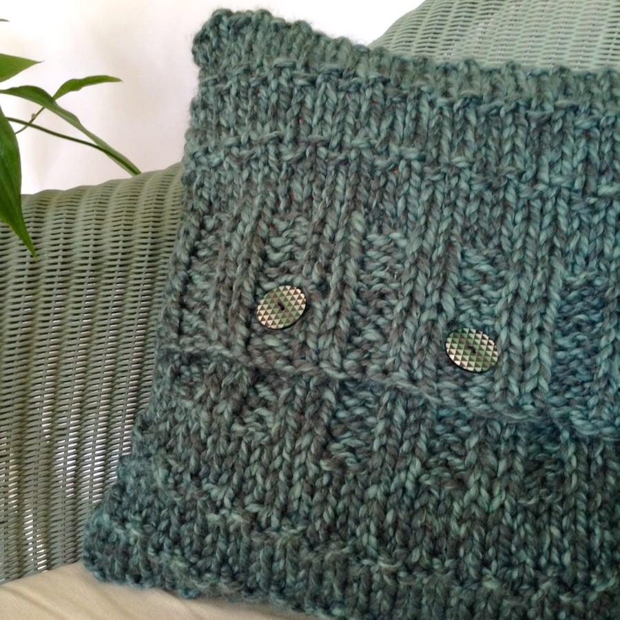 Super chunky hand-knitted cushion cover