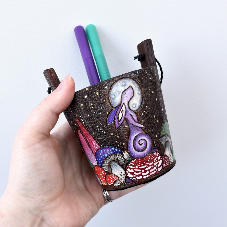 Moongazing hare and toadstools wishing pail pen pot. Created using pyrography. 